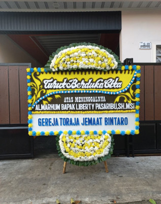 Papan Bunga Duka di Kute Panang